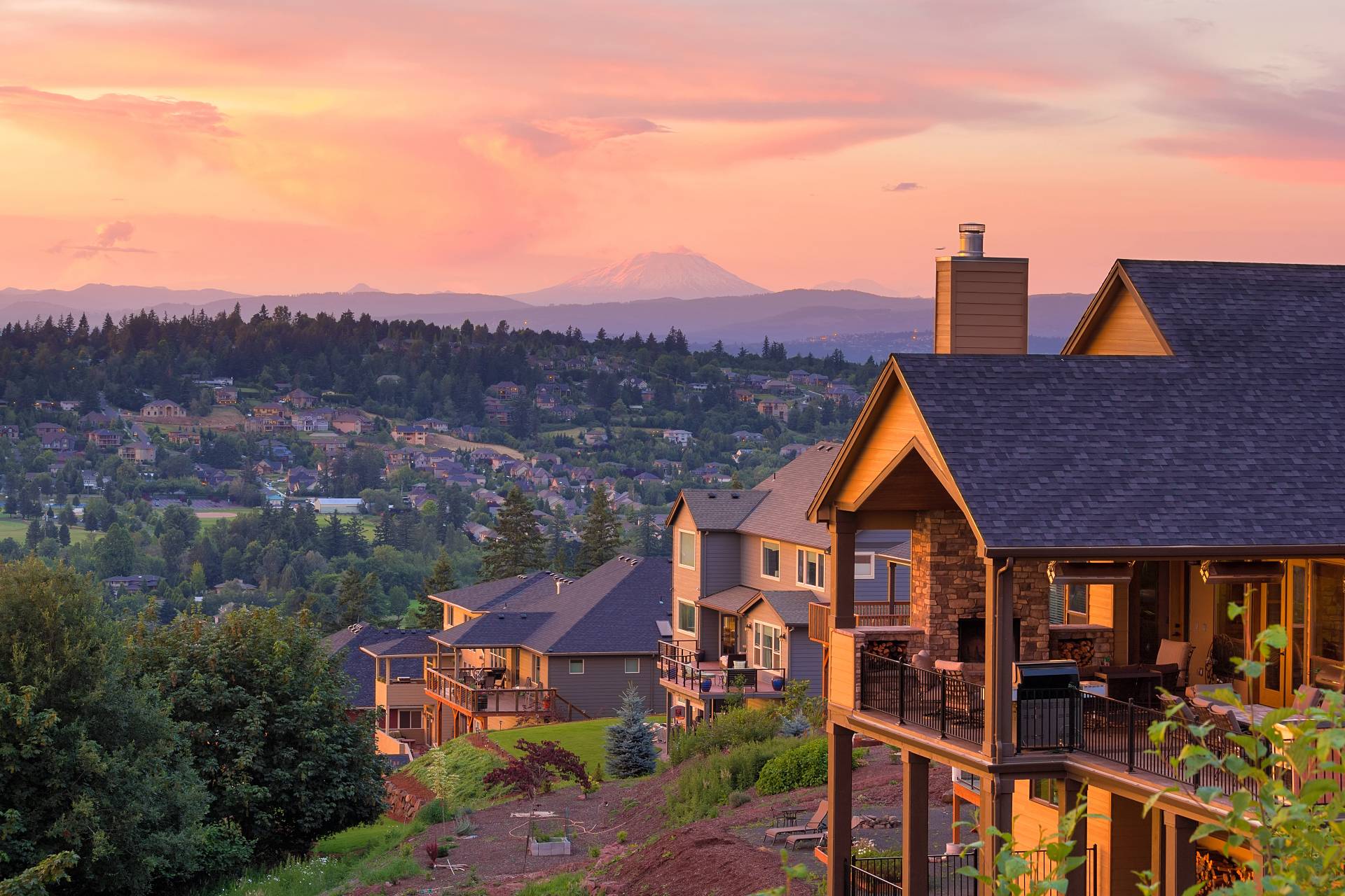 a row of houses on a mountain ridge